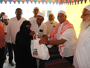 Volunteers distributing essential supplies to communities